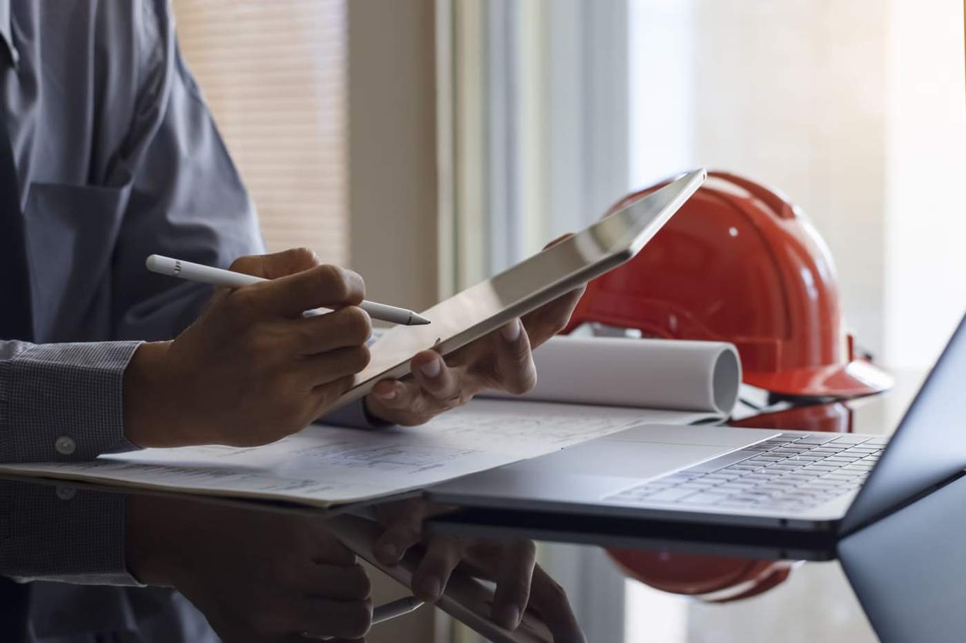 Architect using his tablet to batch plot AutoCAD drawings