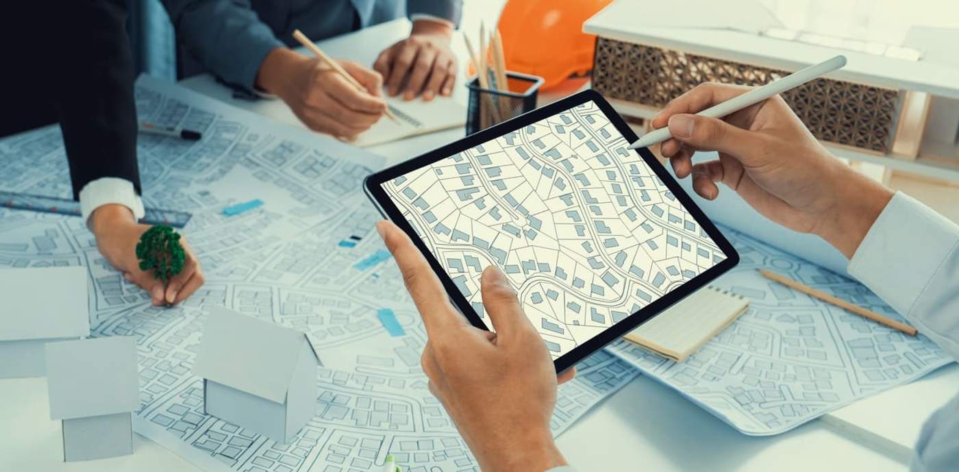 Developer using GIS data and detailed maps to plan growth projects